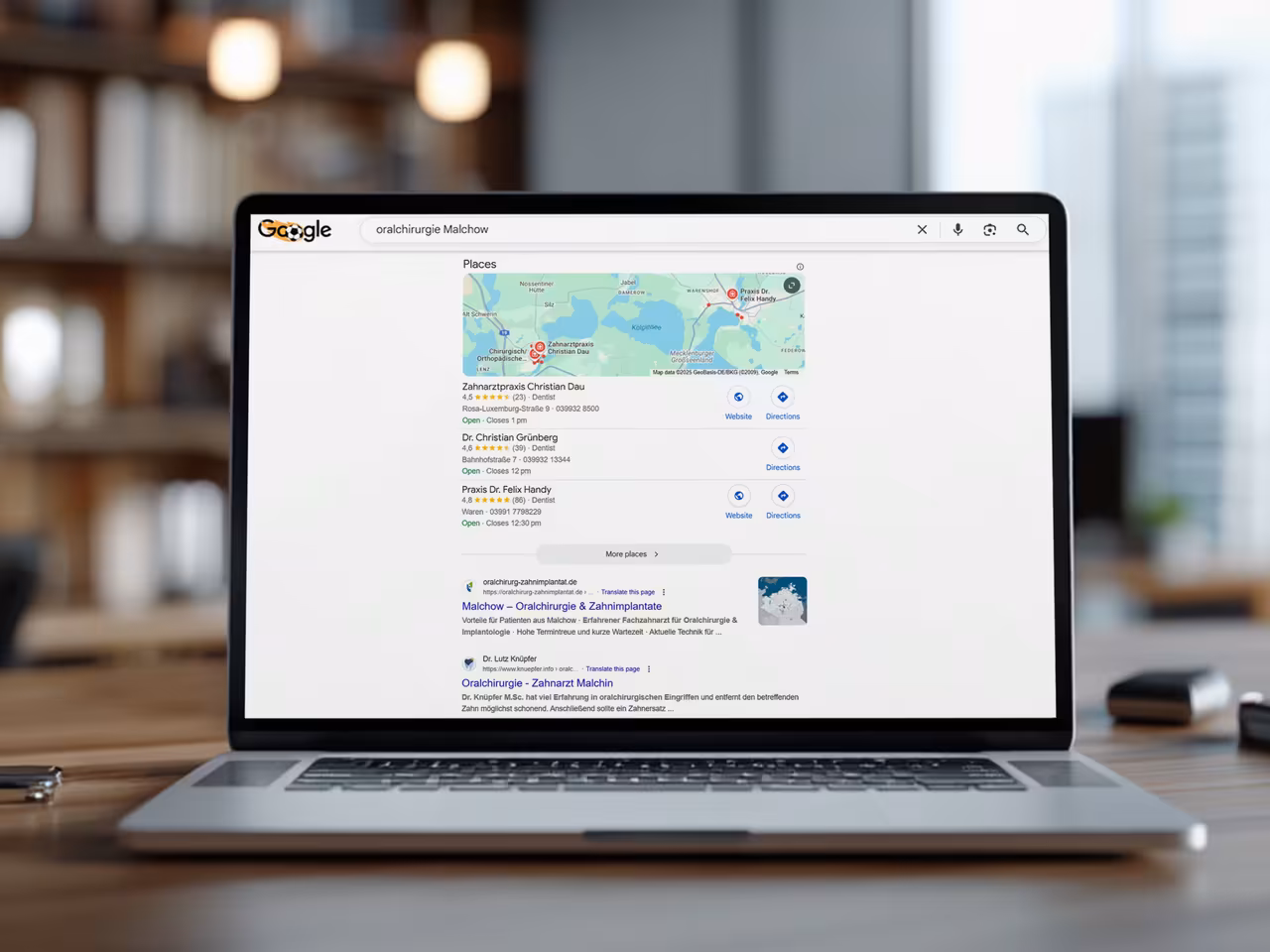 Local SEO results - Google Maps and search results for oral surgery Malchow with Dr. Felix Handy.